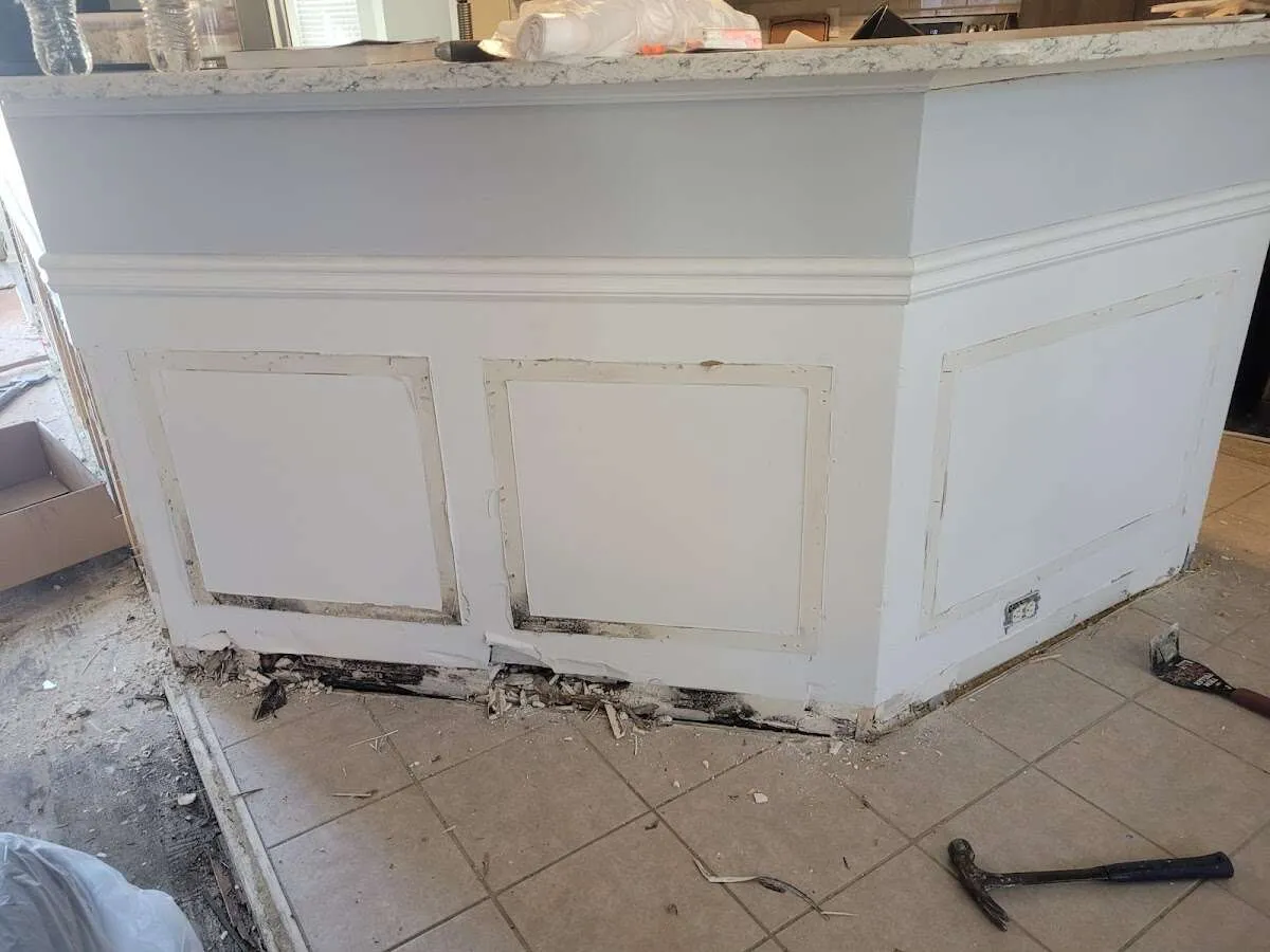 Water damage and mold on kitchen during Storm Damage Restoration in St. Robert